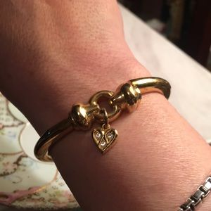 Gold bracelet with heart charm